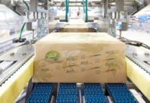 KHS past bestaande traypackers aan voor verpakken van blikjes in papier